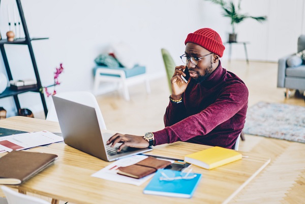 Black man in home office