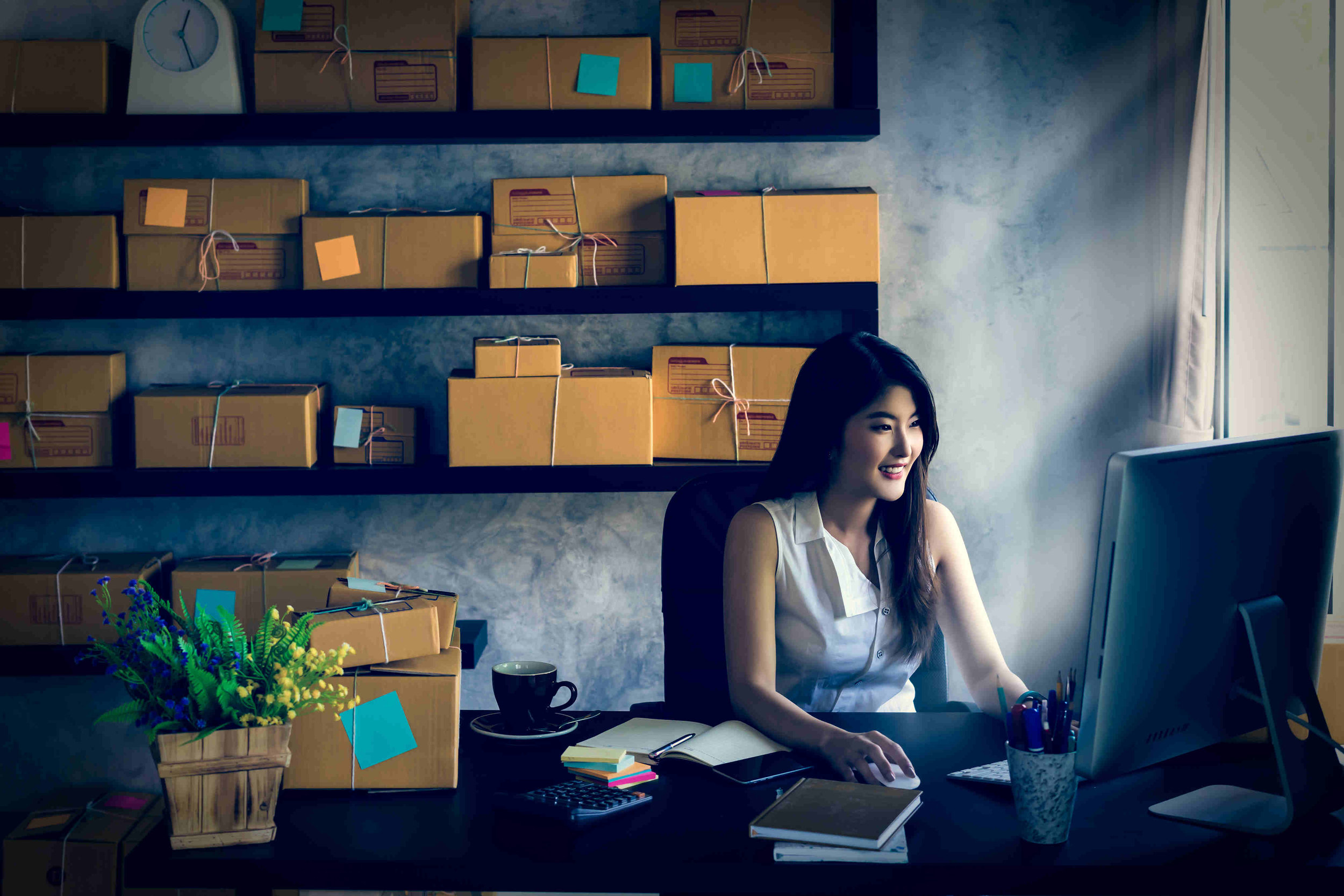 shipping-boxes-package-office-woman-working.jpg