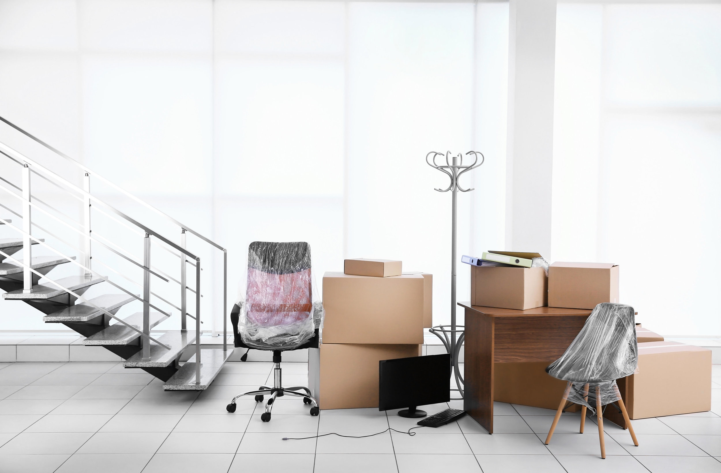 office-equipment-unpacked-in-boxes-white-room.jpg